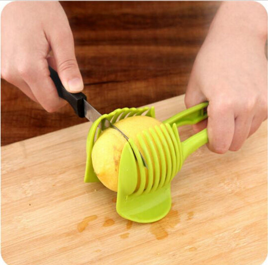 http://robsoncreek.com/cdn/shop/products/Handheld-Creative-Kitchen-Fruit-And-Vegetable-Slicer-Orange-Lemon-Cutter-Cake-Clip-Multi-function-Kitchen-Tool_b13c38a2-5ae4-4c70-97dc-45f5a97b6344_1200x1200.jpg?v=1524285850
